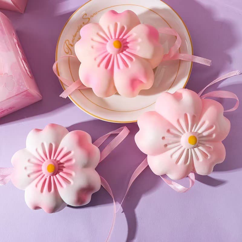 Brinquedo flor de cerejeira pitada música Tofu bola recuperação lenta descompressão bola ventilação ferramenta útil pres