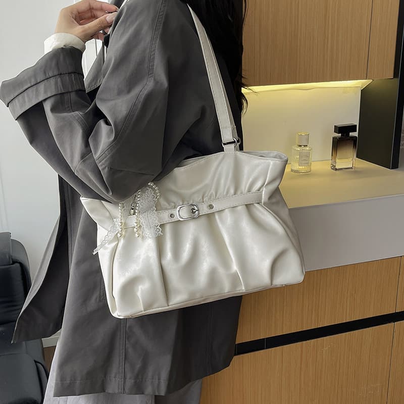 Estilo coreano solto sentir plissado de um ombro axilas saco feminino 2026 novo estilo moda portátil Commuter Tote bolsa