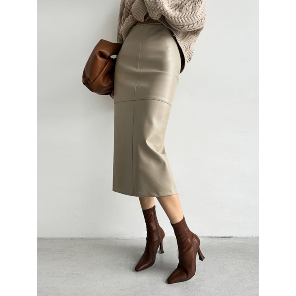 Saia de couro meio comprimento saia feminina 2026 novo estilo outono inverno cintura alta Hip saia elegante comprimento