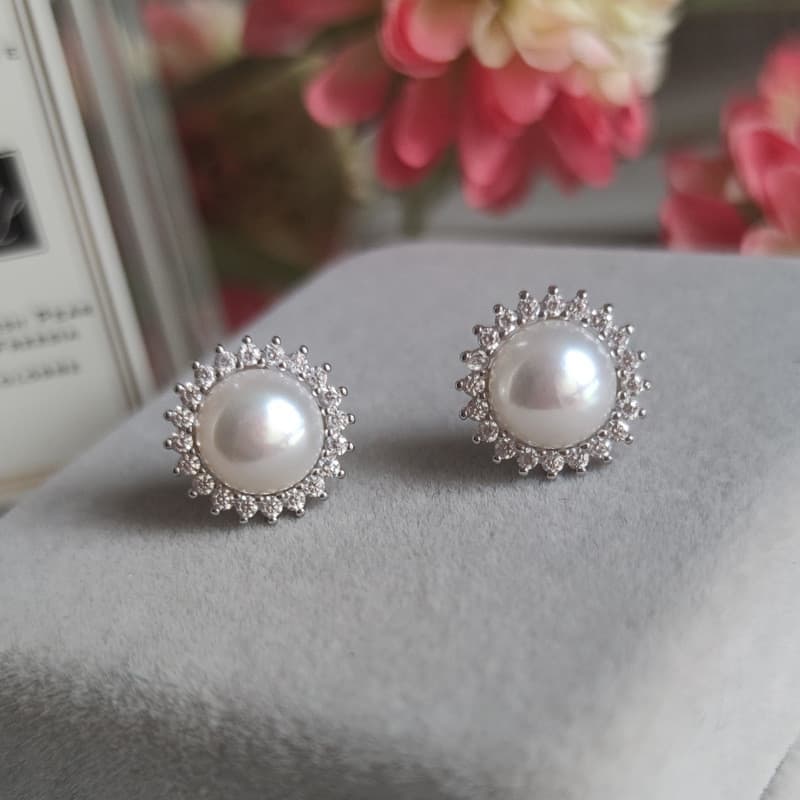 S925 prata agulha girassol pérola brincos feminino High-End luz luxo nicho brincos nova moda brincos