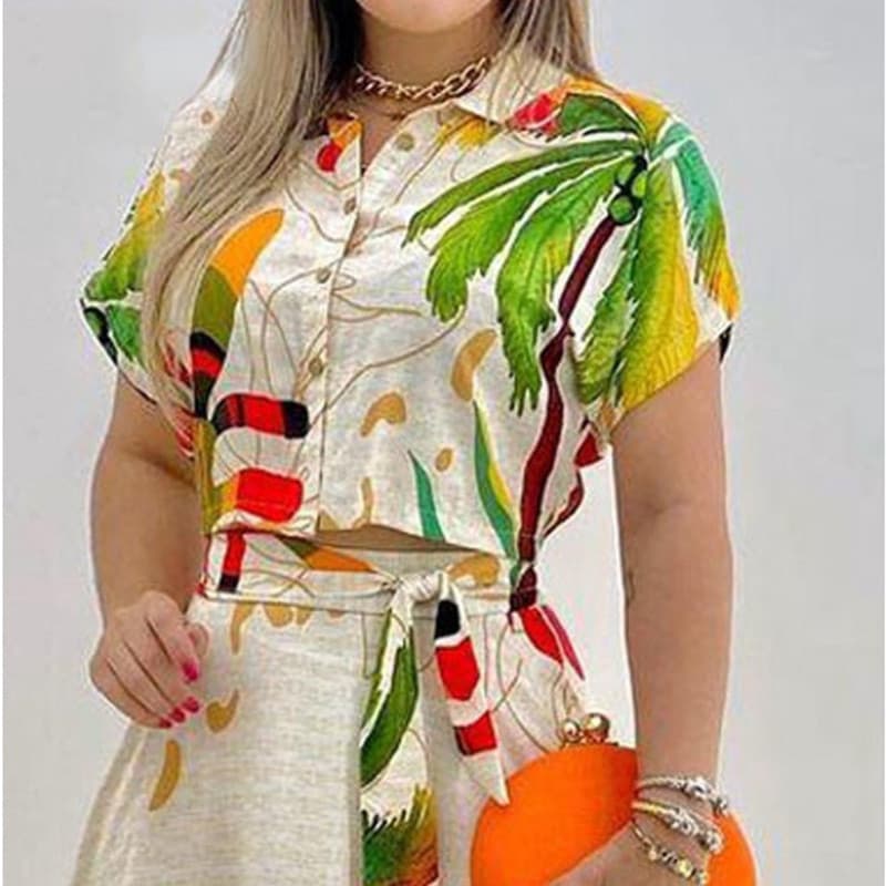 Conjunto feminino de duas peças: top cropped de manga curta com estampa floral boho e saia longa. ACIX FF8A