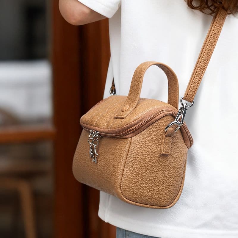 Pequena casa pequena saco cosmético feminino portátil passeio 2025 novo estilo High-End pequeno bonito saco de armazenam