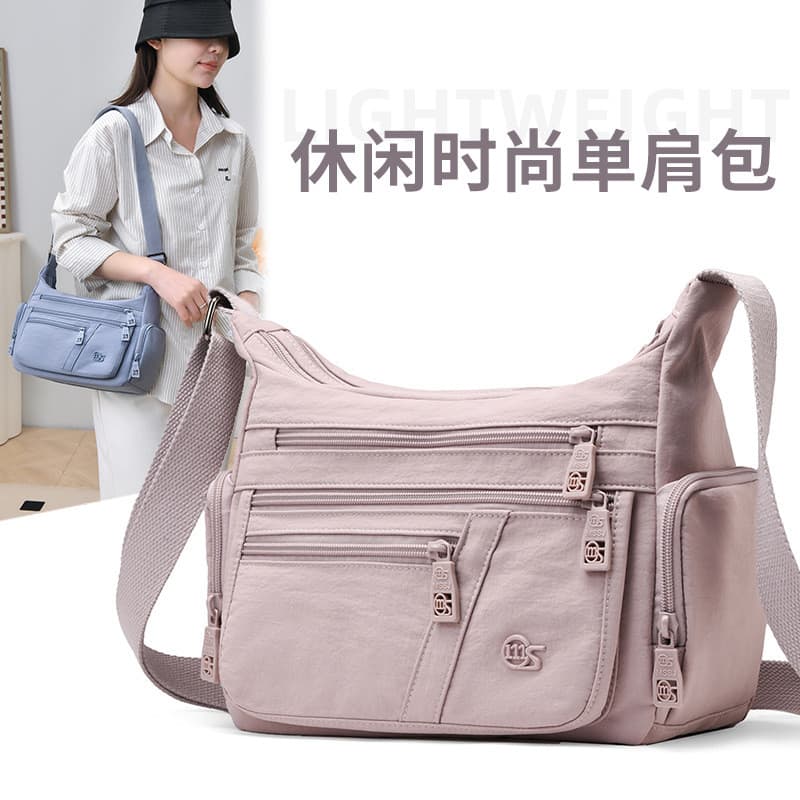 2026 novo estilo moda saco de náilon grande capacidade senhoras saco do mensageiro lazer leve saco de viagem de meia-ida