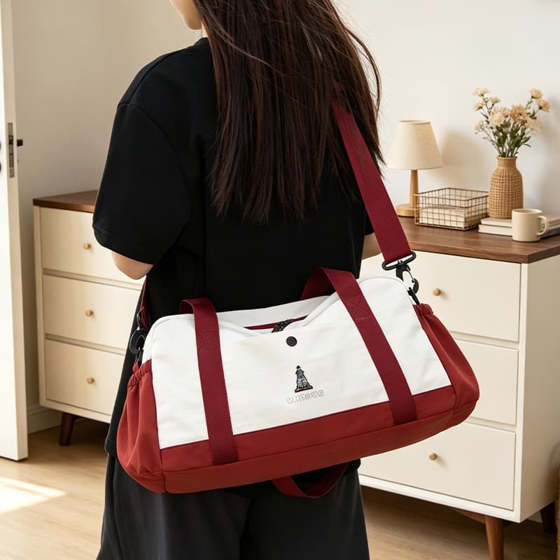 Nova bolsa de viagem leve de grande capacidade feminina Casual simples portátil de um ombro saco de ginástica de curta d