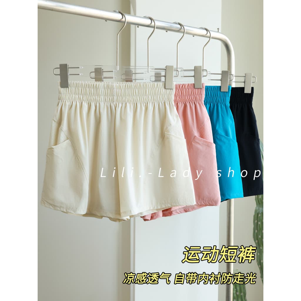 Esportes shorts de secagem rápida feminino bonito Pilates roupas de treinamento de Fitness calças de três pontos profiss