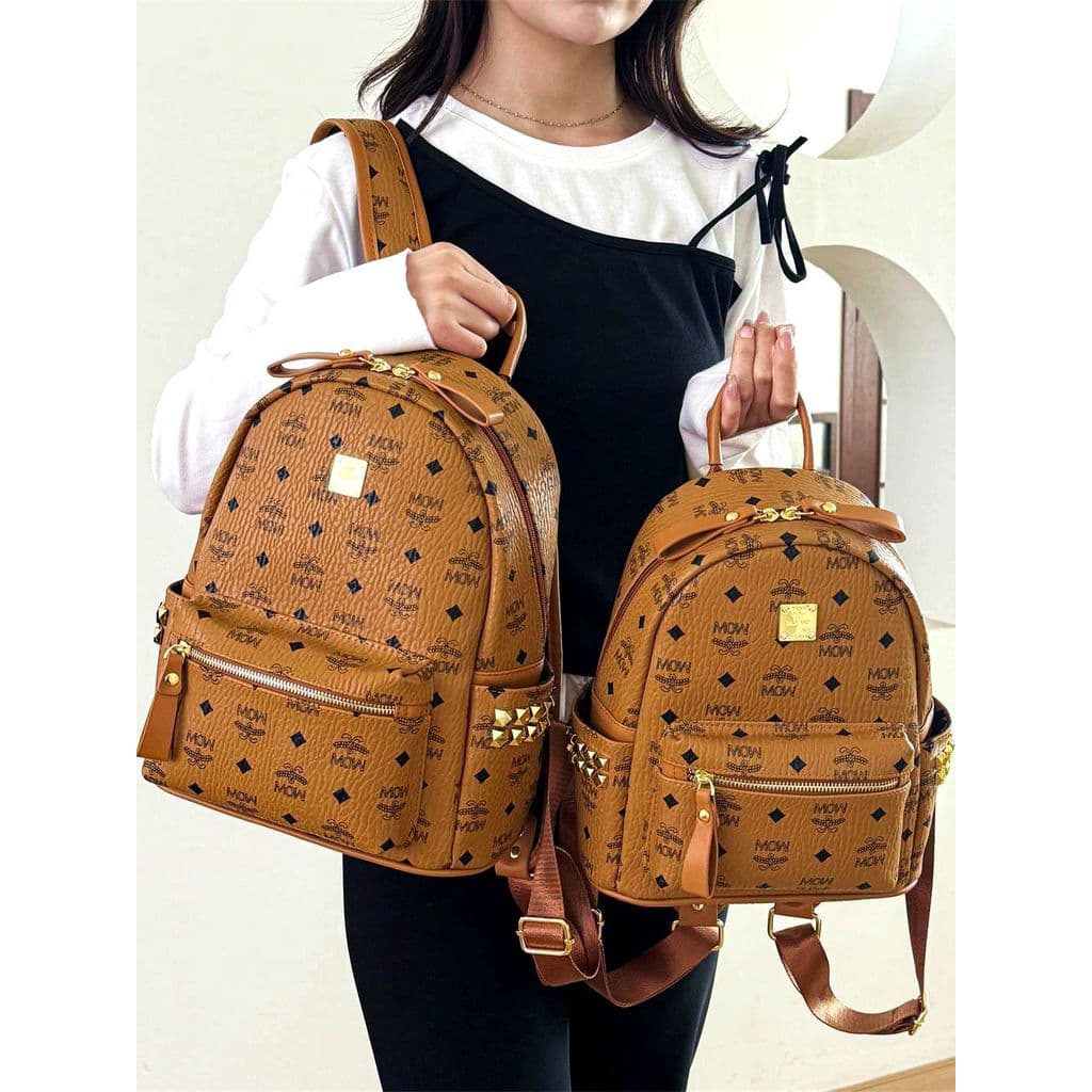 Muzi rua rebite mochila feminina 2026 novo estilo moda grande capacidade impresso saco de escola All-Match couro macio C