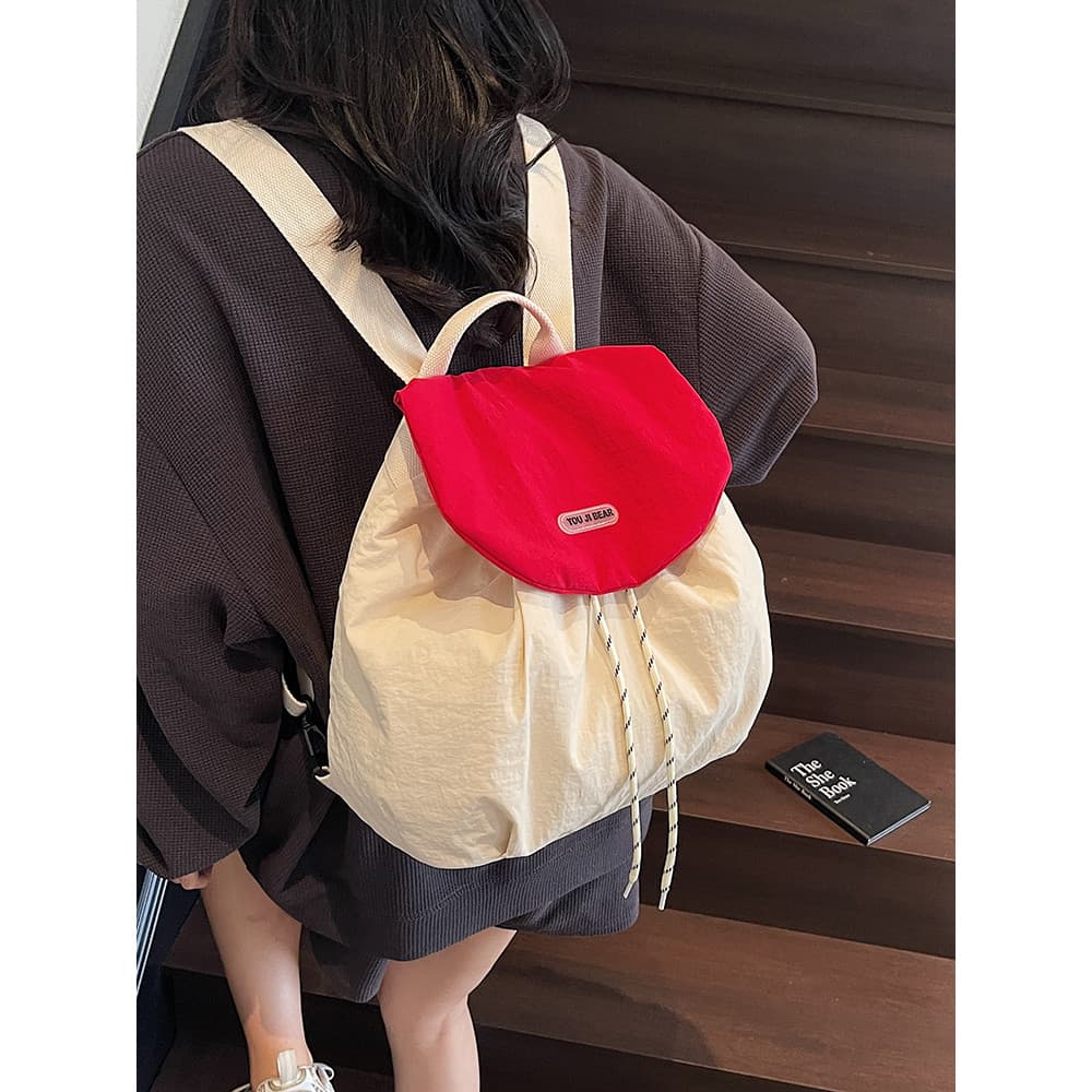 Mochila de viagem leve feminina 2026 novo estilo Casual All-Match estudante mochila contraste cor cordão balde mochila