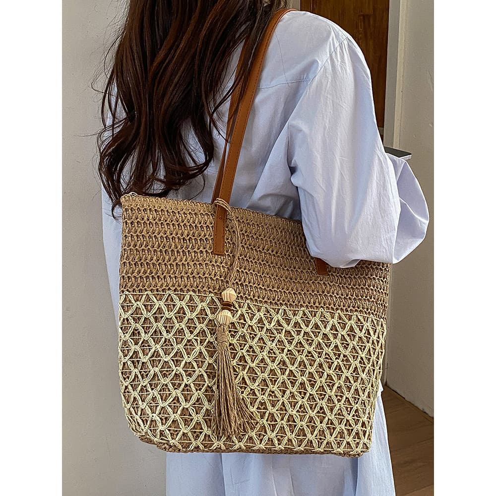 Verão venda quente bolsa de palha feminina 2026 novo estilo grande capacidade moda tecido bolsa de ombro oco Commuter sa