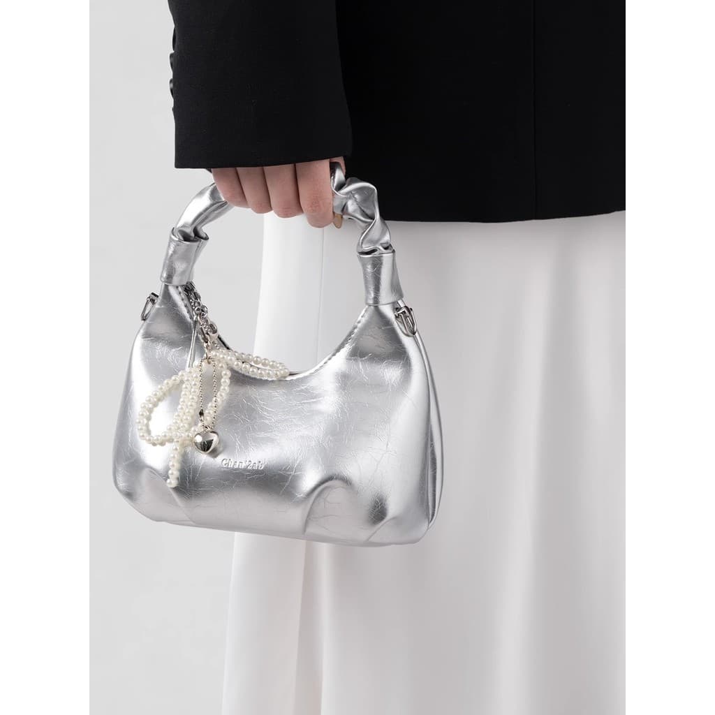 bolsa feminina Bolsa UR Super venda quente saco de prata feminino 2025 novo estilo portátil dobrado bolinho saco High-En