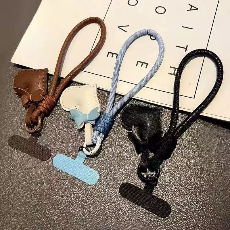 Alça De Pulso De Telefone Com Pingente De Coração De Arco Bonito , Acessório De Cordão Anti-Perda Curto