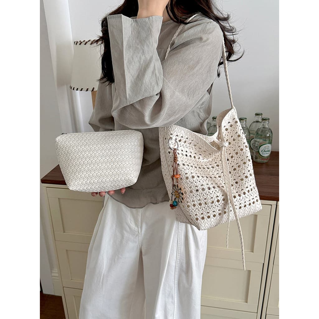 bolsa feminina Bolsa Verão refrescante oco pequeno saco feminino 2026 novo estilo na moda tecido padrão balde saco simpl
