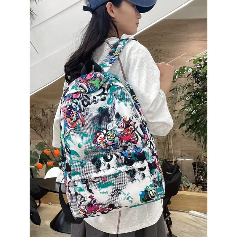 Novo estilo estudante mochila meninos Graffiti quadrinhos estudantes do ensino fundamental leve mochila feminina moda te