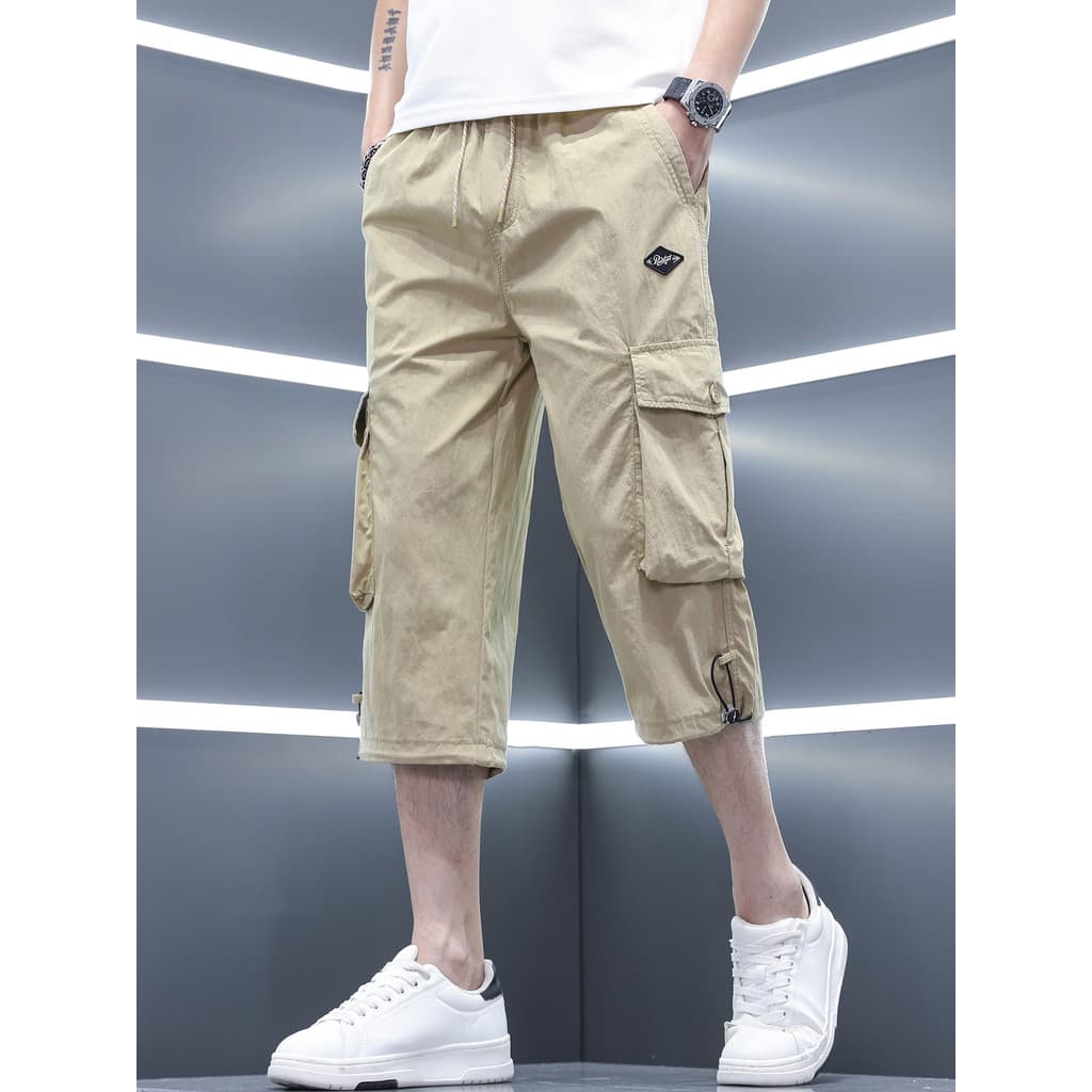 2026 novo estilo calças cortadas Shorts masculinos verão estilo fino calças de 7 pontos calças médias macacão Casual mas