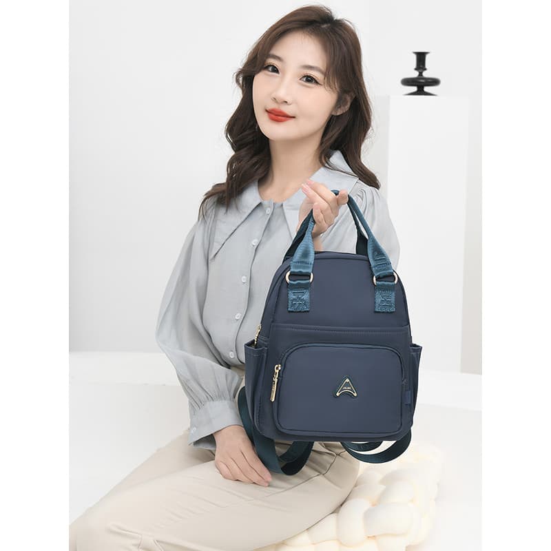 Leve Oxford pano mochila feminina portátil Casual passeio multifuncional náilon mãe saco bebê mãe moda pequena mochila