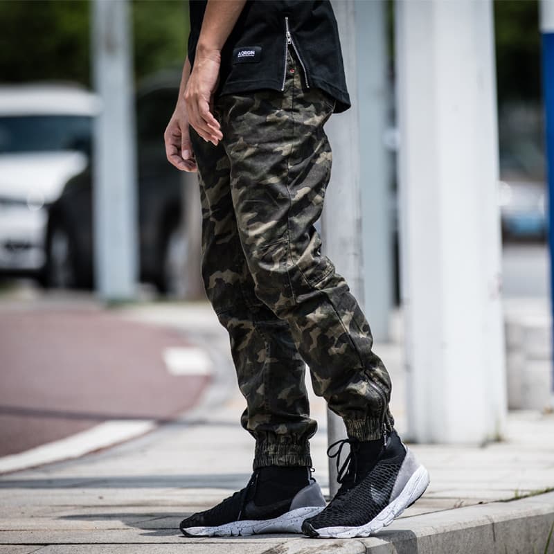 Quatro estações Street Wear Casual perna estreita zíper calças com cordão camuflagem calças masculinas Harem calças magr