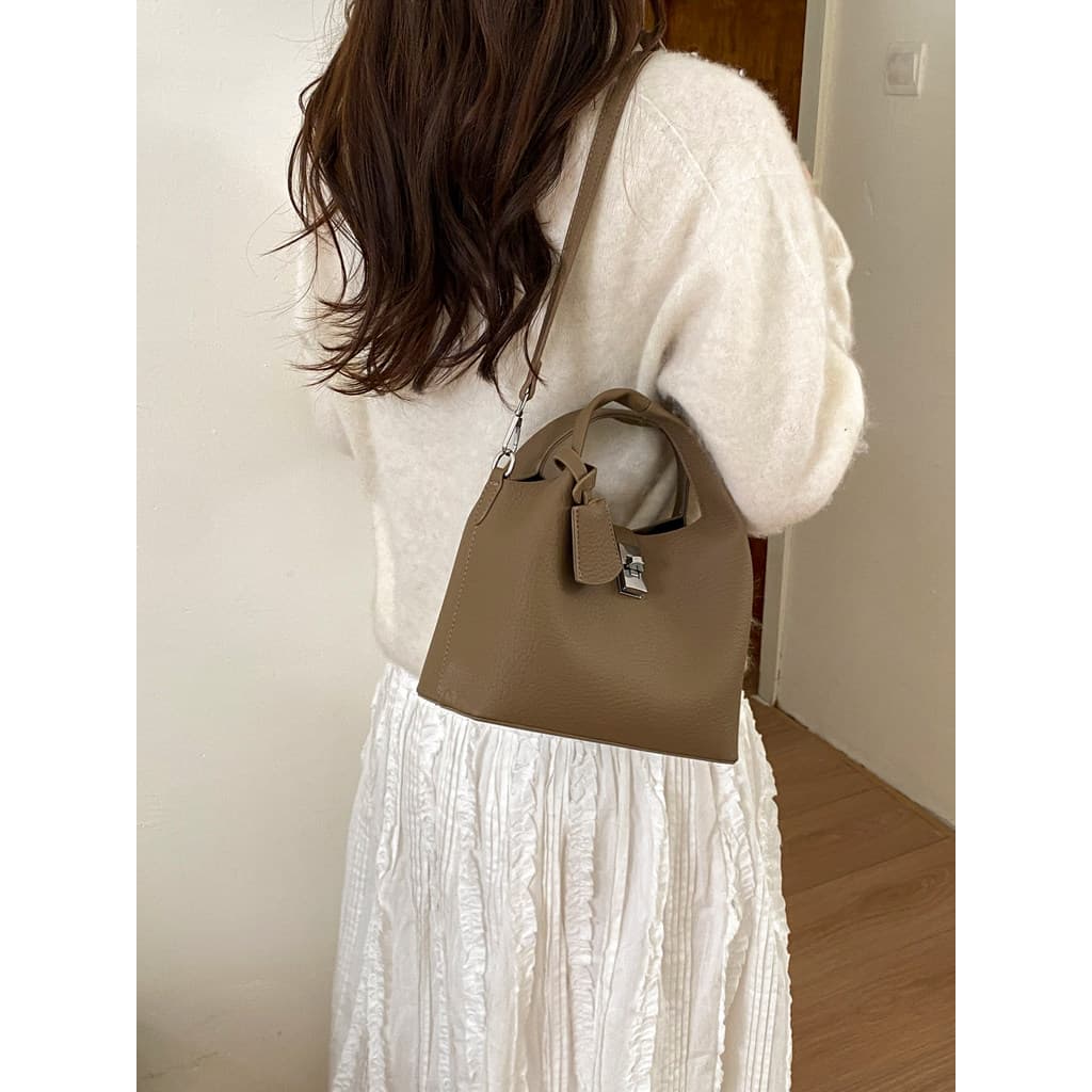Bolsa bolsa transversal feminino Saco pequeno feminino estilo minimalista pequeno balde saco luz luxo Commuter portátil