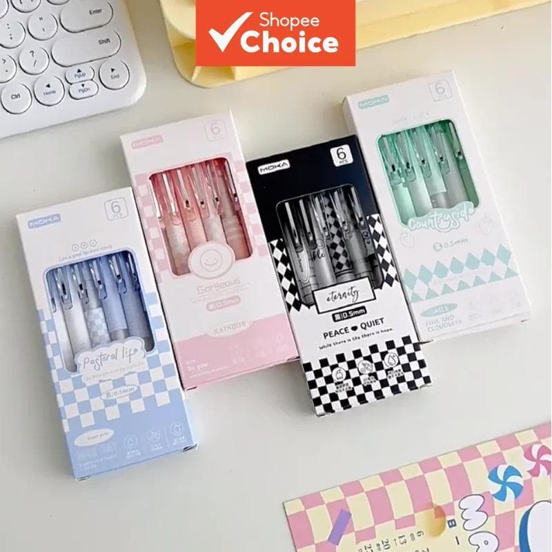 Conjunto de 6 canetas gel retráteis, disponíveis nas cores rosa, azul, verde e preto, adequadas para material escolar.