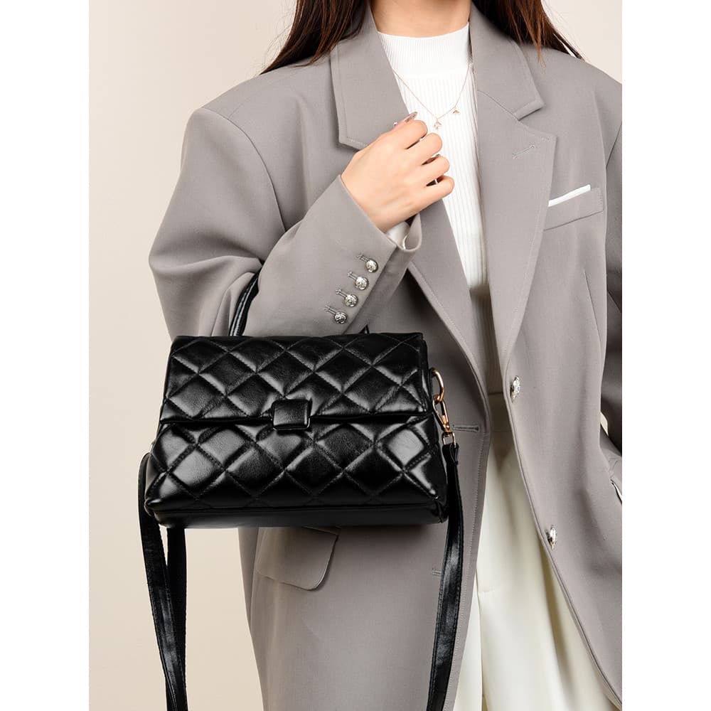 Couro genuíno 2025 outono inverno novo estilo senhoras High-End textura bolsa feminina nicho portátil de um ombro cruz-c