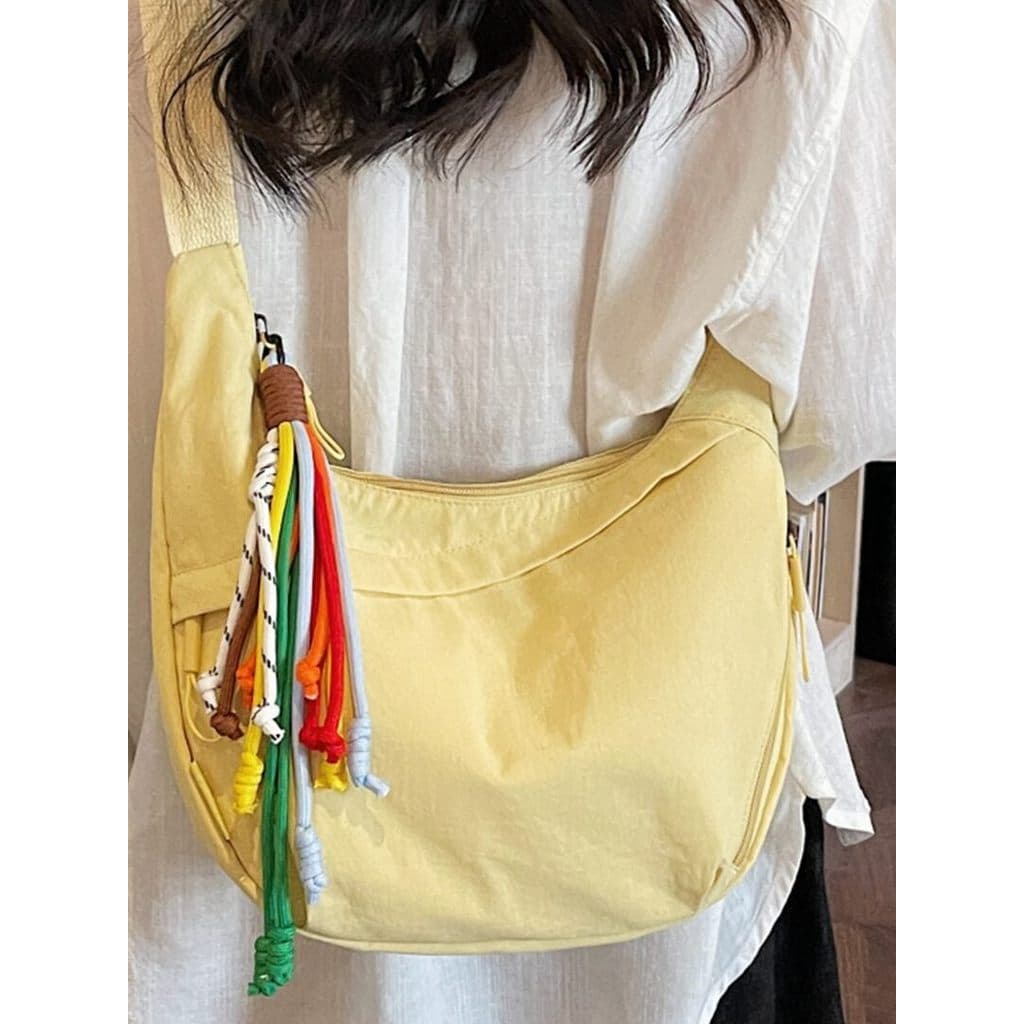 Francês primavera verão simples bolsa Casual senhoras 2026 novo estilo leve lona bolsa de ombro Commuter mensageiro boli