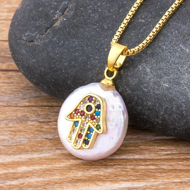 Novo colar de ouro da moda com formato de mão de Hamsa e palma de Fátima com olho azul peruano, incrustado com diamantes
