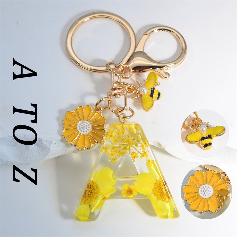 Pingente De Abelha Pérola Artificial Fofo 26Letters Chaveiro Fashion Daisy Flower Cheio De Resina Mulher Homem Bolsa De