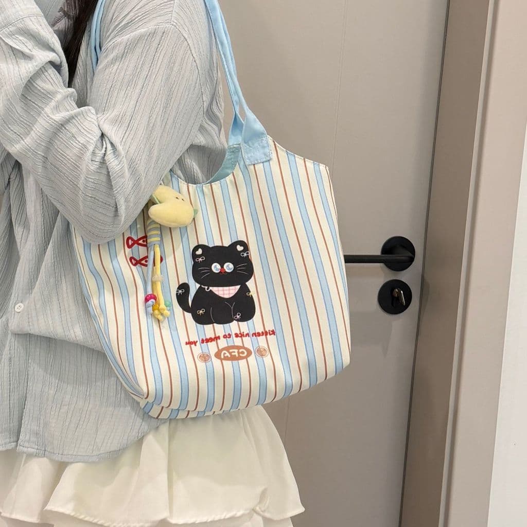 Bolsa de ombro casual estilo coreano com estampa de gato de desenho animado, para estudantes universitários, leve e list