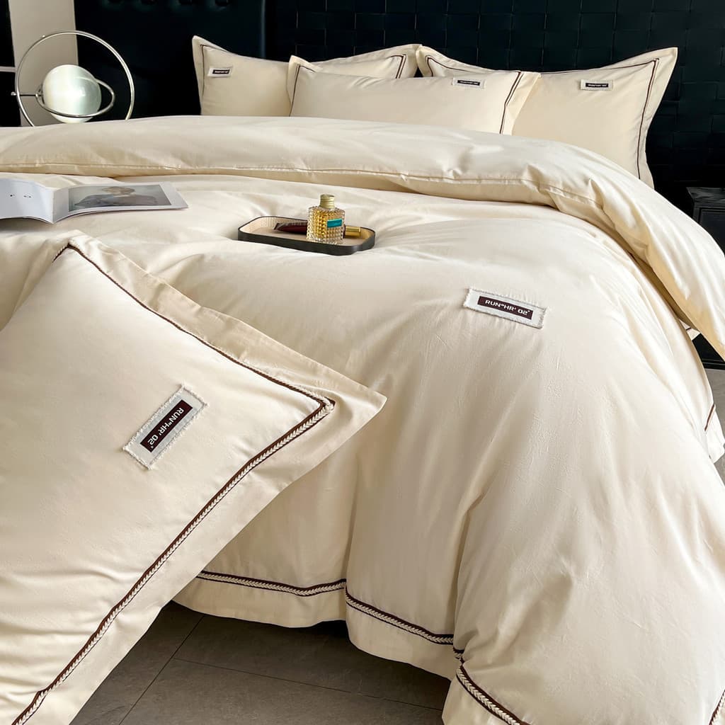 Conjunto de quatro peças de algodão estilo luxuoso leve, capa de edredom, lençol de algodão puro, estilo primavera verão