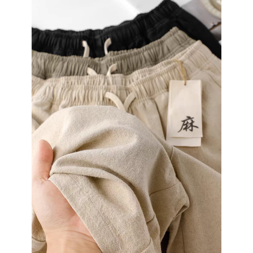 2026 Shorts casuais de linho de algodão respirável cáqui de alta qualidade masculino solto reto absorvente de suor cinco