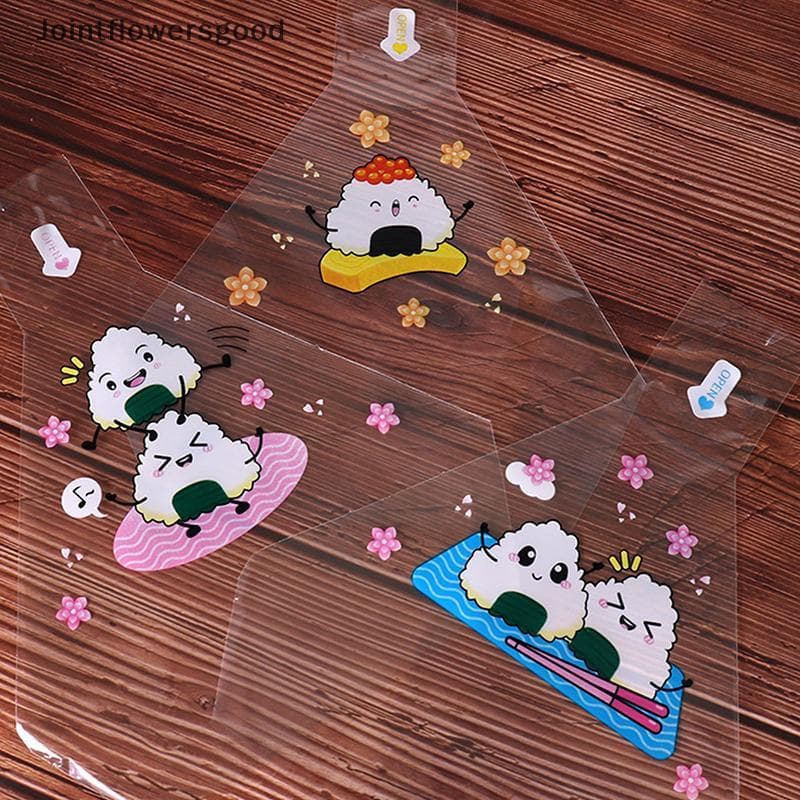 JTFG 100 Pcs Bonito Dos Desenhos Animados Triângulo Bola De Arroz Paing Saco Algas Sushi Molde Bento Acessórios De GD