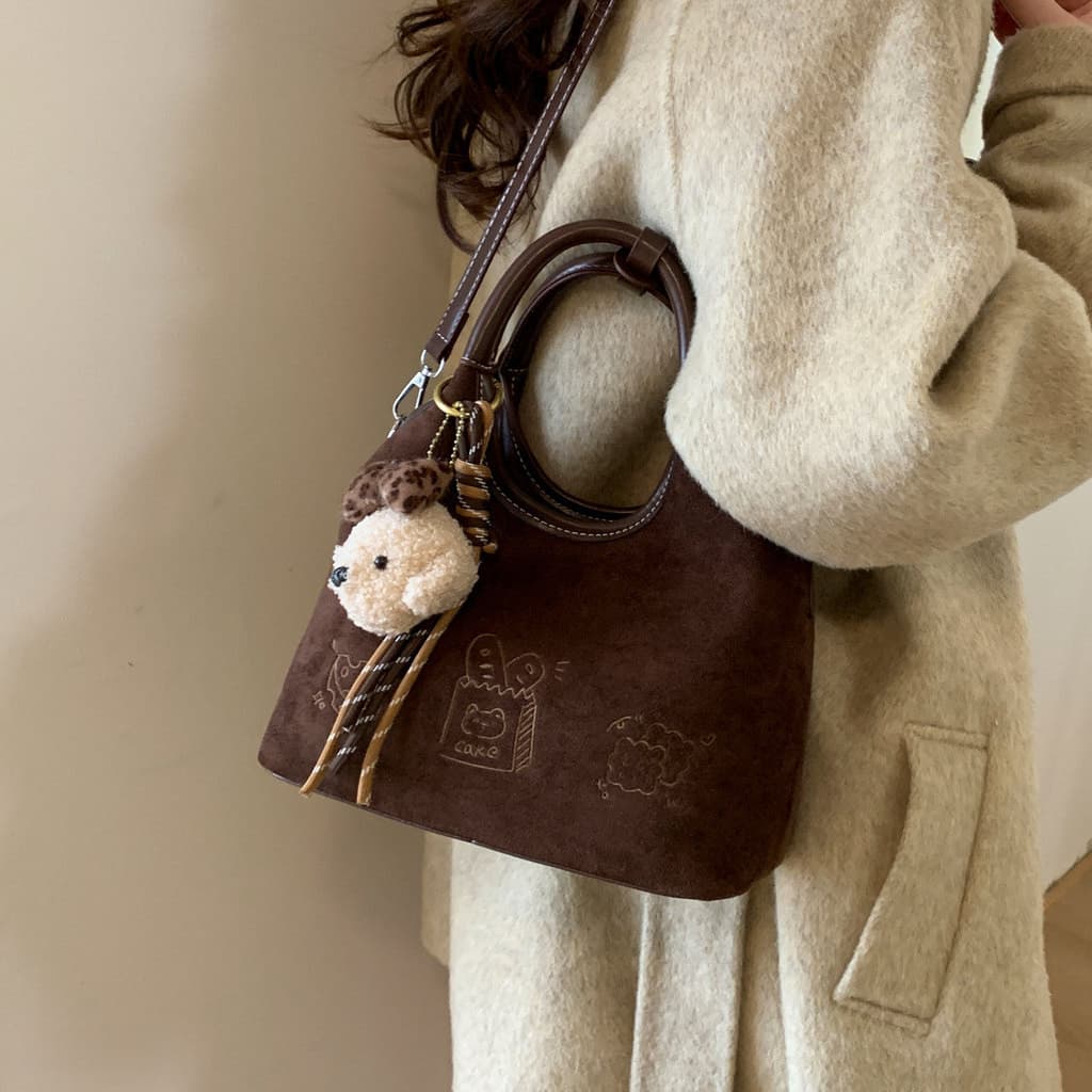 High-End Retro textura portátil sacola 2025 novo estilo feminino Commuter camurça moda Casual balde saco do mensageiro
