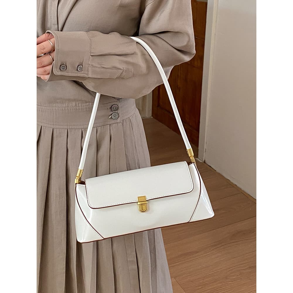 High-End textura de um ombro axila saco feminino 2026 novo estilo moda trabalho Commuter triângulo saco simples All-Matc