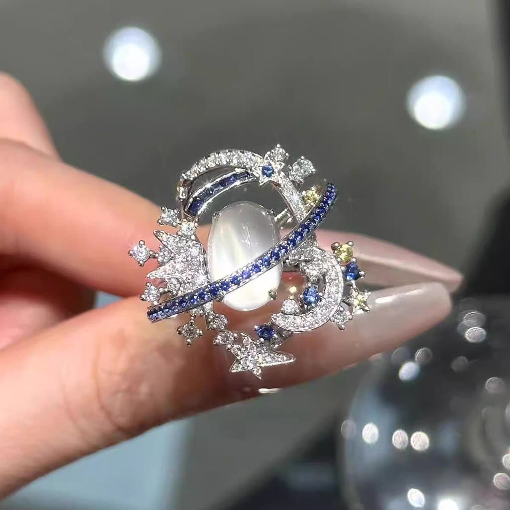 Anel de Luxo "Estrela Cósmica" com Luzes Piscantes de Estrela e Lua, Design Moderno com Diamantes, Acabamento Exquisito,