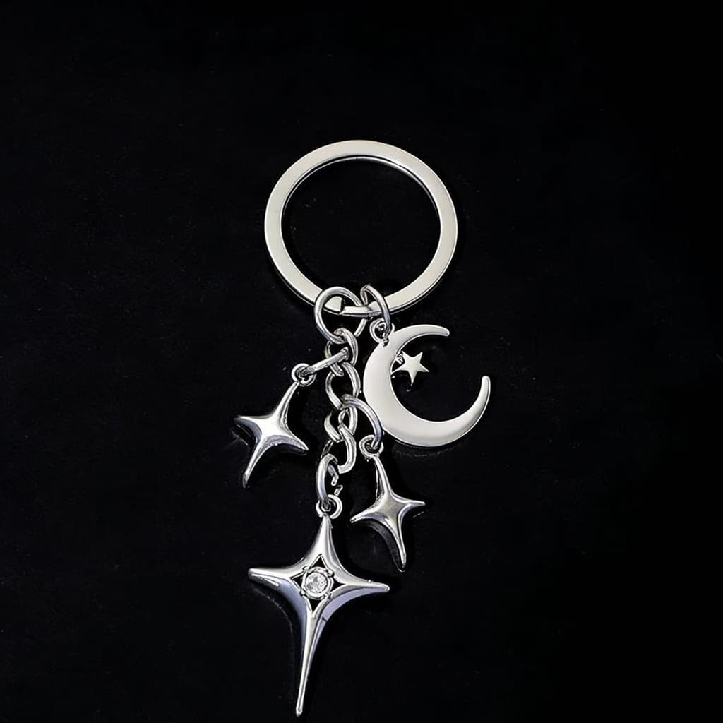 Super quente simples Metal oco quatro pontas estrela lua pingente chaveiro masculino feminino saco de bagagem decoração