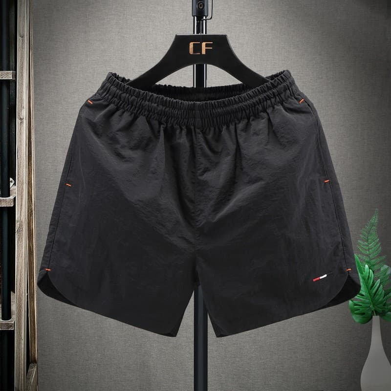 Calças de três pontos de secagem rápida Shorts esportivos masculinos Desgaste exterior Slim-Fit Shorts masculinos casuai