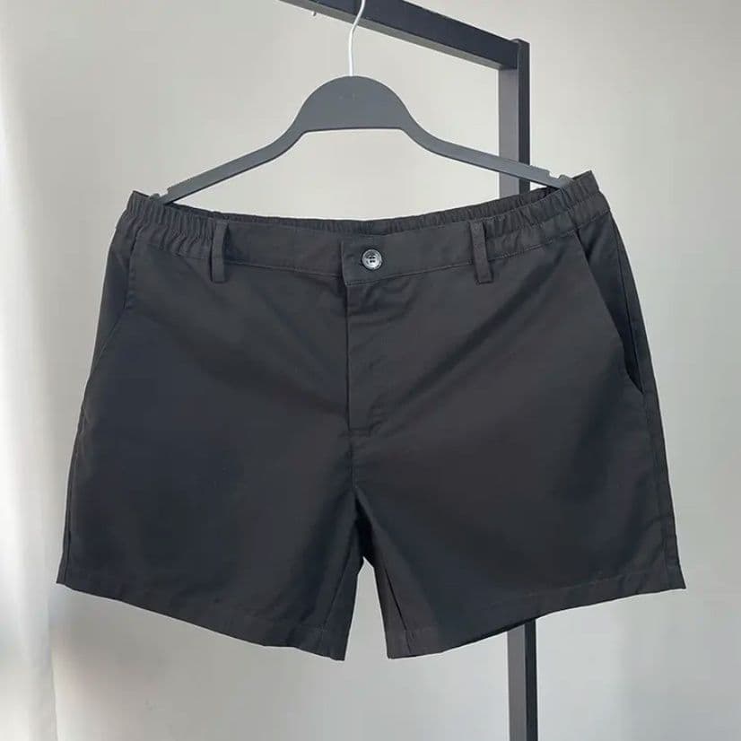 Calças de três pontos de verão masculinas Slim-fit All-match versão coreana na moda Casual cor sólida botão fino Design