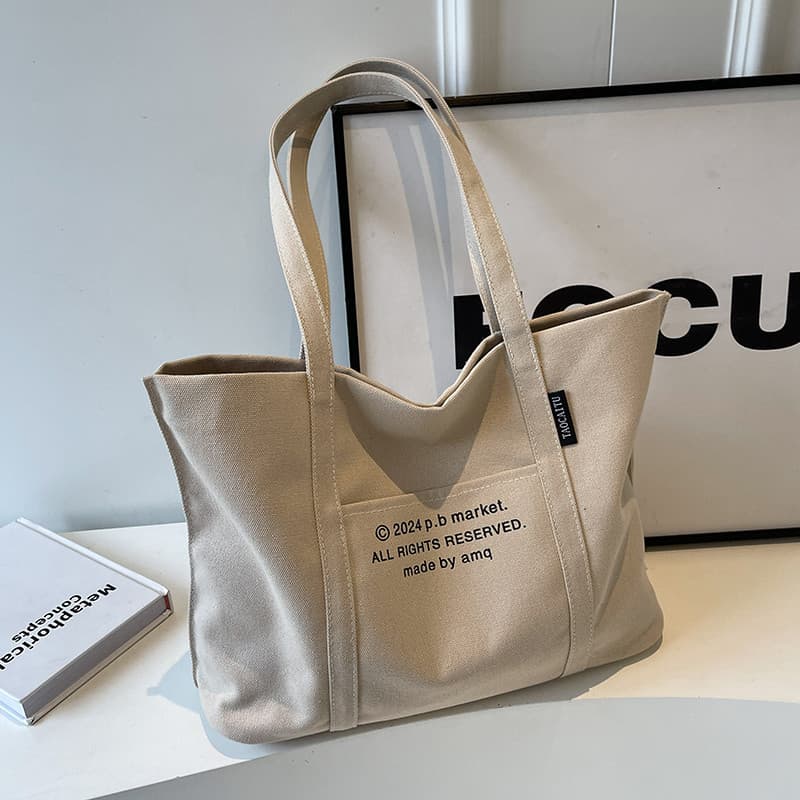 Grande capacidade de lona Casual trabalho Commuter saco feminino 2026 novo estilo All-Match Tote classe saco de compras