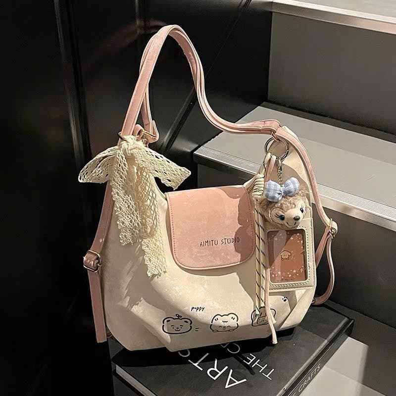 Bolsa feminina com estampa de urso fofo, design jovial, estilo coreano, mochila de veludo multifuncional e elegante TXN1