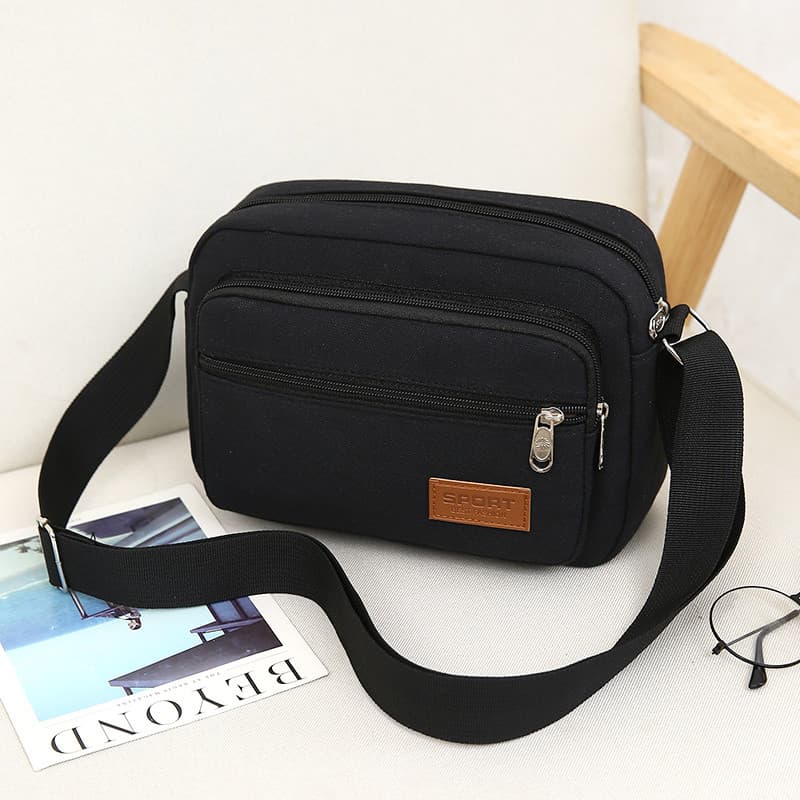Moda novo estilo bolsa masculina Oxford pano bolsa feminina bolsa de ombro Diagonal Horizontal Casual mochila masculina