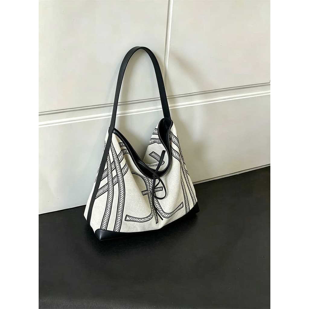 Bolsa de lona bordada requintada com textura Popular deste ano feminina 2026 verão grande capacidade Casual retrô bolsa