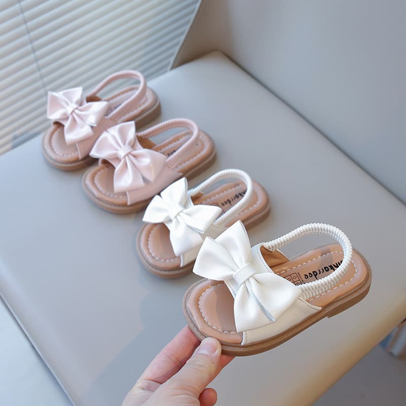 2026 verão novo estilo meninas arco moda sandálias crianças sapatos de princesa sola macia Anti-deslizamento sapatos de