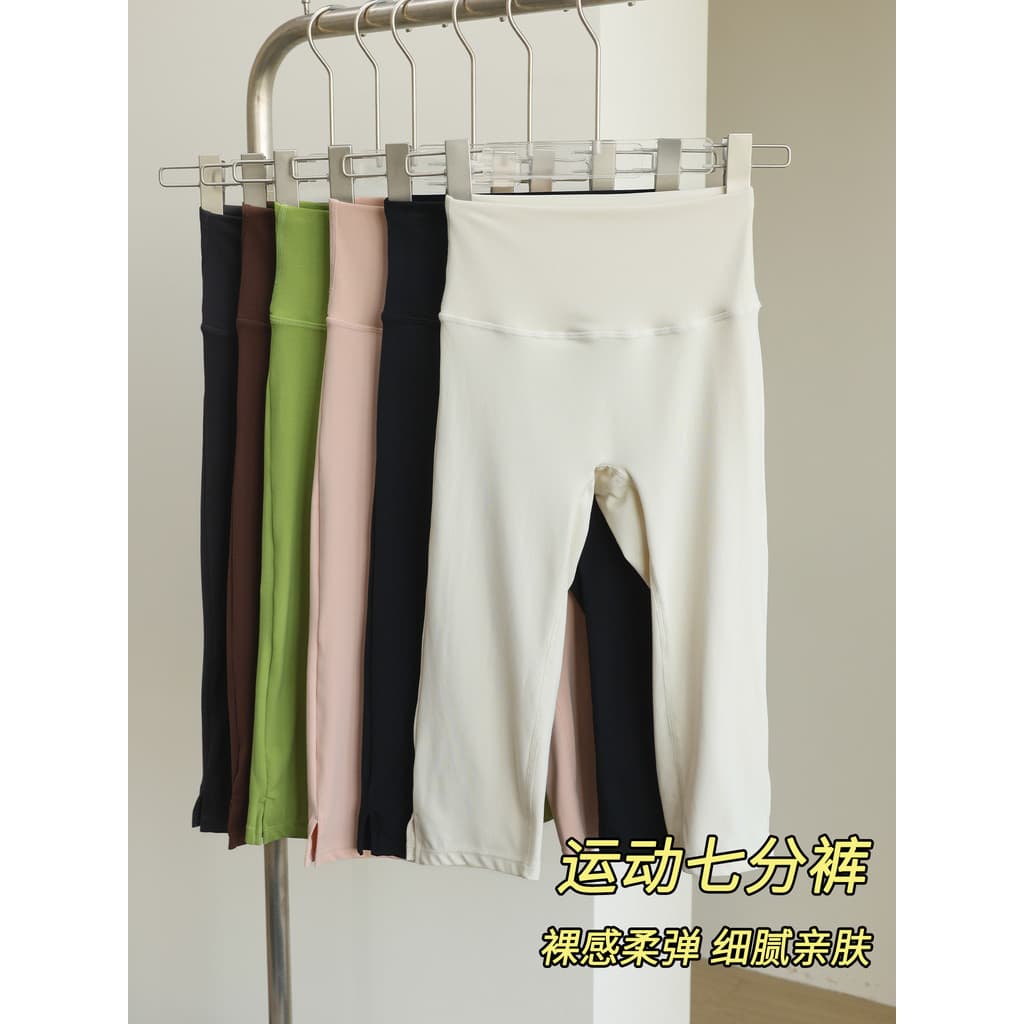 Calças de Yoga femininas novo estilo cintura alta bonito Pilates treinamento wear Anti-reflexo correndo esportes cortado