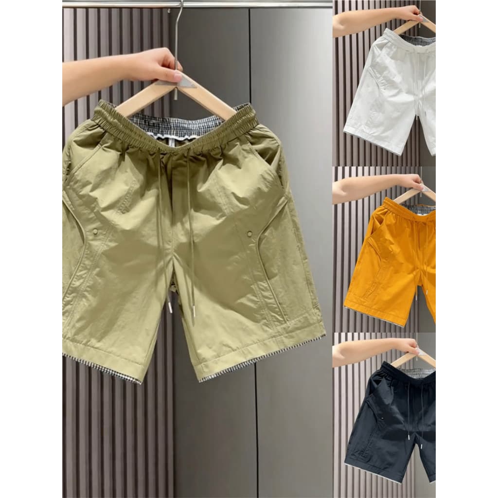 Verão novo estilo na moda costura Shorts de secagem rápida masculino moda All-Match solto calças casuais respirável