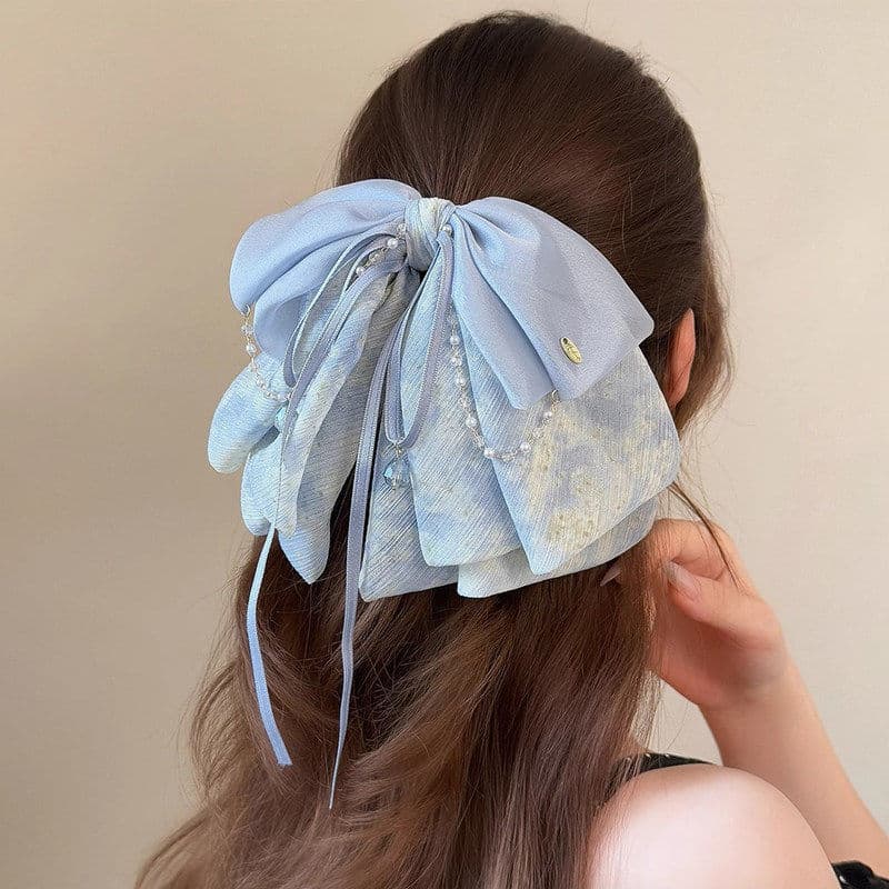 [Estoque pronto] Grampo de cabelo Super fada pérola borla arco feminino 2026 novo estilo grampo de cabelo High-End cabeç