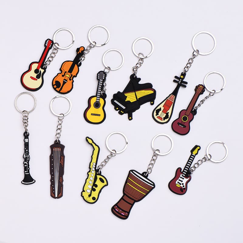 Instrumento musical chaveiro Piano guitarra violino saxofone clarinete tambor africano Ukulele Silicone chaveiro