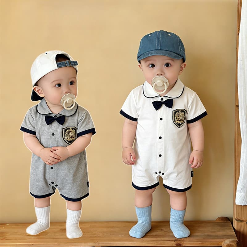 Macacão infantil de manga curta verão estilo fino mês inteiro cem dias de idade menino vestido de bebê macacão 2026 novo