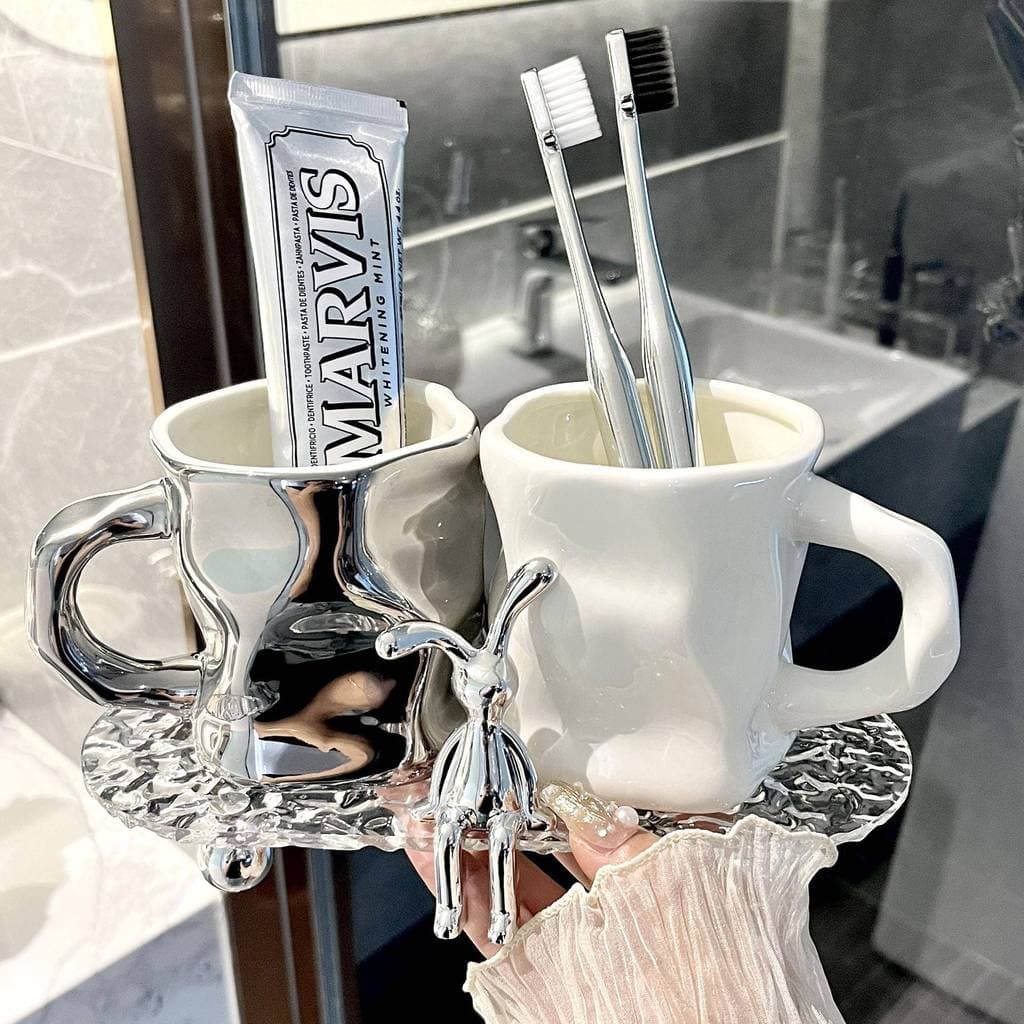 Luz de luxo escova de dentes Rack prateleira perfuração-livre toalete lavatório pasta de dentes copo escovação conjunto