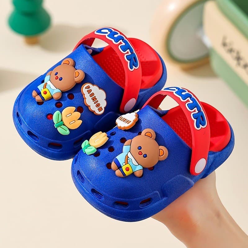 2026 crianças buraco sapatos Baotou respirável anti-colisão sola macia casa passeio sapatos de praia anti-deslizamento b