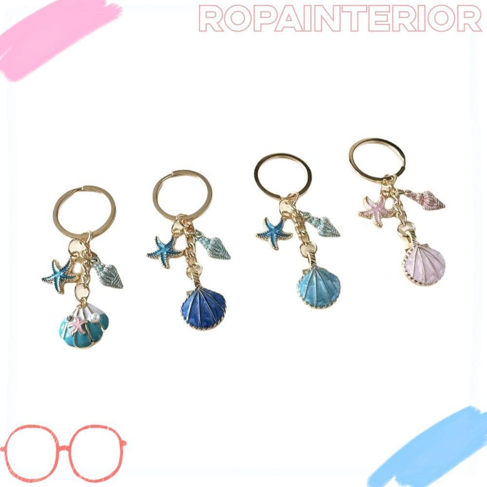 Chaveiro Oceano ROPAINTERIOR , Esmaltado Em Tom Dourado De Concha Inspirado No Mar Com Pingente De Estrela Do