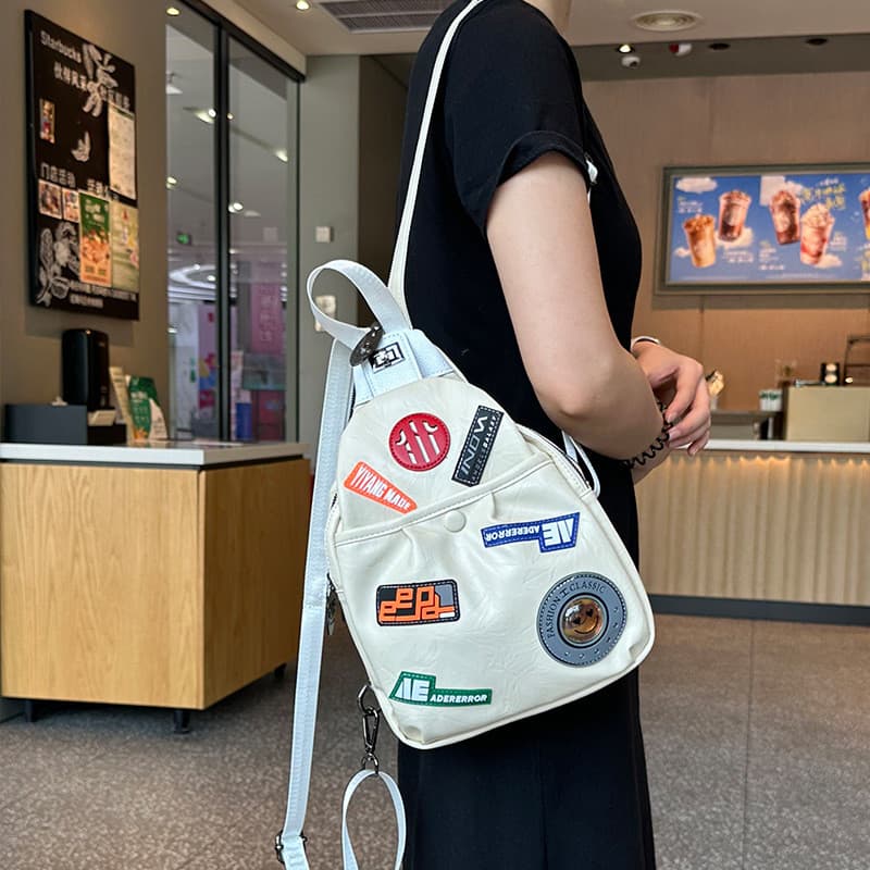 Bolsa transversal 2026 em PU, bolsa feminina, bolsa tipo balde, bolsa cilíndrica com emblema, bolsa de ombro de grande c