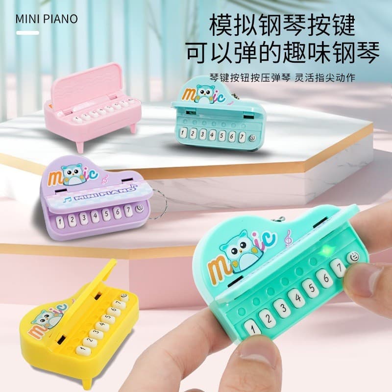 Criativo Mini teclado eletrônico Console de jogos chaveiro música portátil jogando pequeno Piano bonito brinquedo das cr